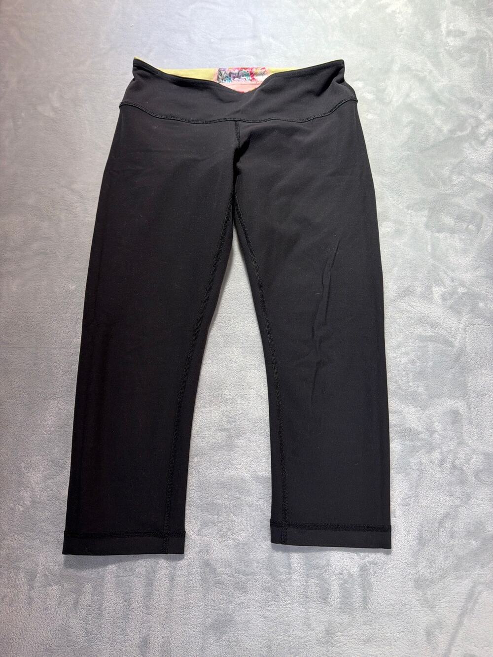 Lululemon Astro Crop Yoga Pants Size 6 Black Yellow Pink Foldover Waistband